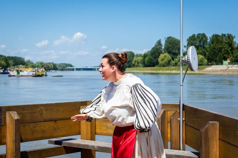 Actress rehearsing, wearing traditional folk costume, location City of Osijek,